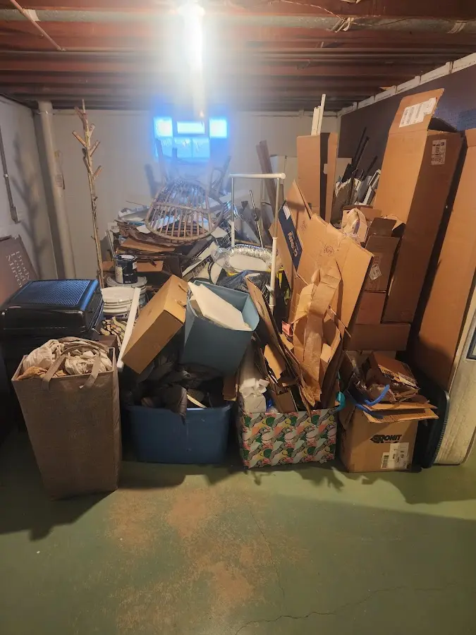 Roll-off dumpster container at job site for Yard Waste Dumpster Rental in Pembroke